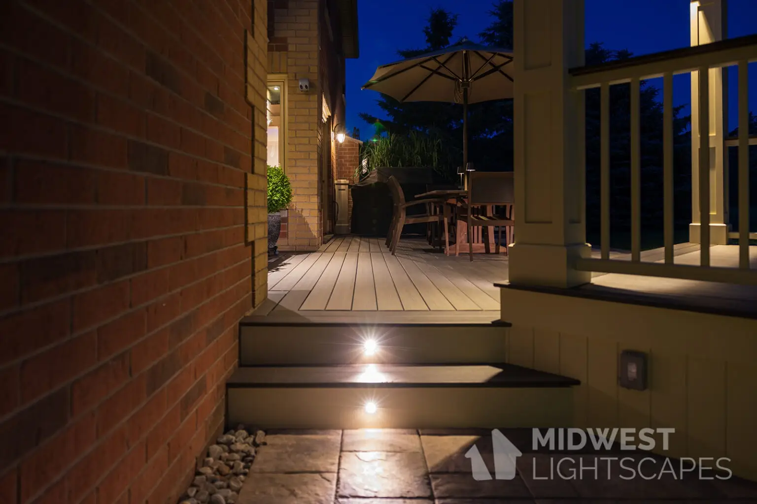 Beautiful residential deck at night.