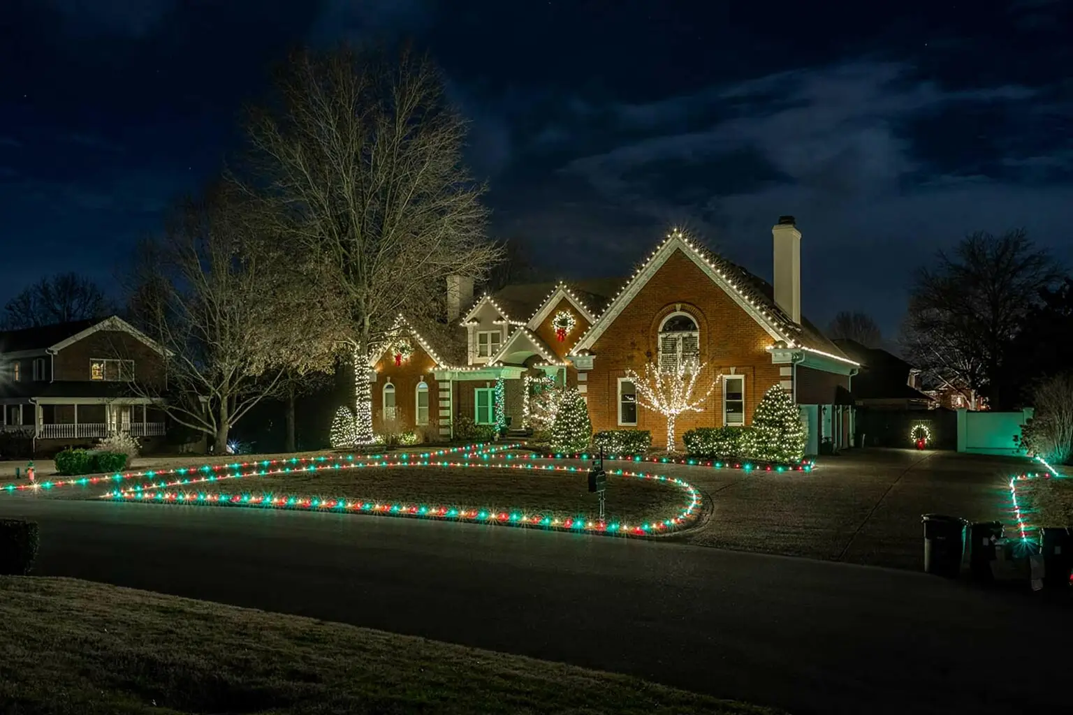 a house with christmas lights on the front